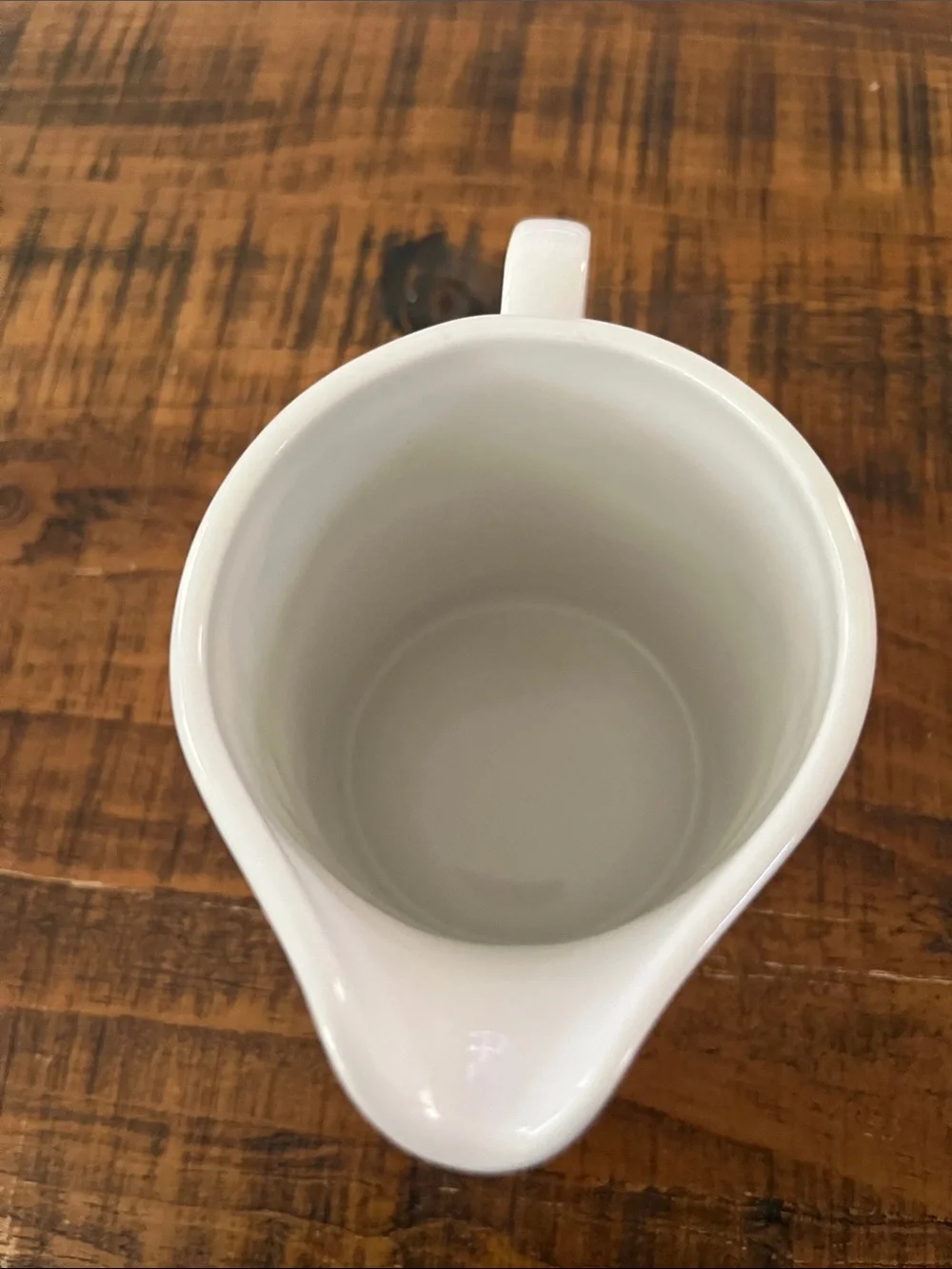 Classic White Ceramic Creamer with Embossed Detail